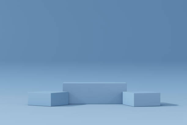 istock Cosmetic display product stand. Three blue blocks set on pastel background. 3D rendering illustration 1355060003