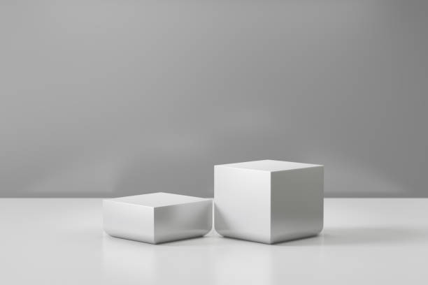 istock Cosmetic display product stand. Two gray blocks white background. 3D rendering illustration 1355060017