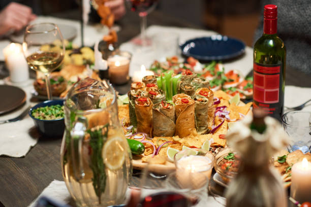 istock Delicious appetizer with bottle of wine on the table 1355060565