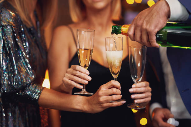 istock Nice friends having fun on christmas or new year party 1355060779