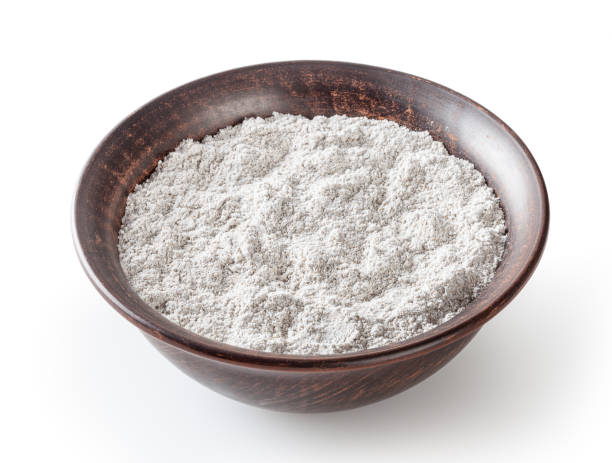 istock Rye flour in ceramic bowl isolated on white background with clipping path 1355060993