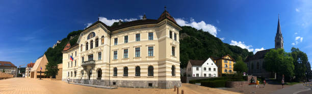 Wide shot of Vaduz Main Street, Liechtenstein on a clear summer day.