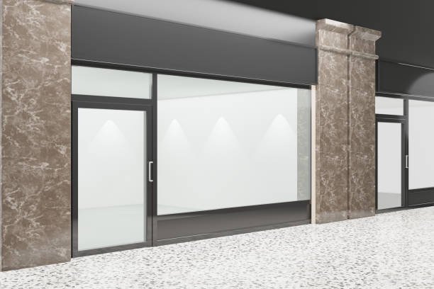 istock An empty storefront of shop. Design with black aluminuin and glass marble floor. 3D Illustration Rendering. 1355065899