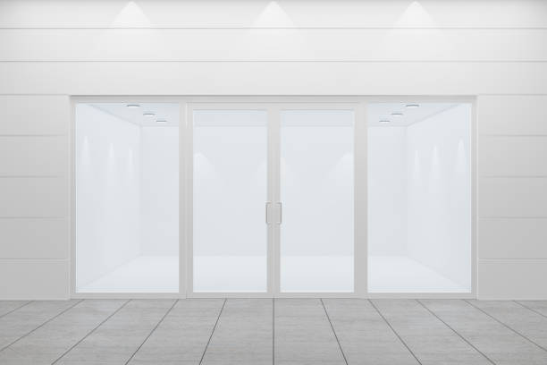 istock Front view of an empty storefront of shop. Design with white aluminuin and glass. 3D Illustration Rendering. 1355065904