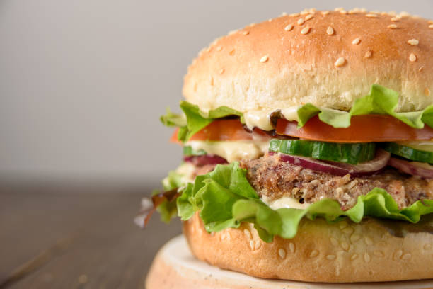 istock Vegetarian burger with bean patty 1355069788