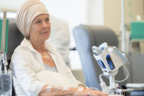 istock Senior Woman Receiving Chemotherapy 1355071701