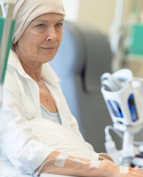 istock Senior Woman Receiving Chemotherapy 1355071704