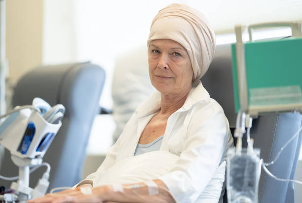 istock Senior Woman Receiving Chemotherapy 1355071709