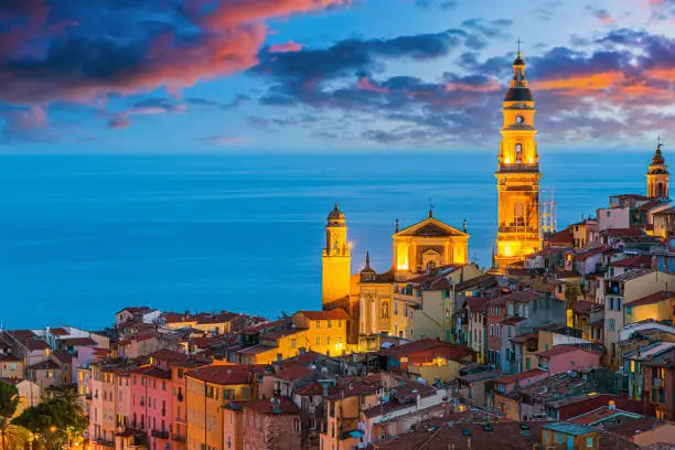 Old town architecture of Menton on French Riviera after sunset