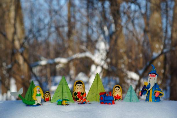 istock Fairy-tale characters in a snowy forest. 1355073573