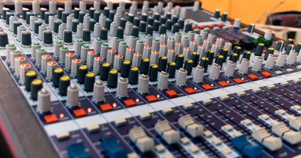 istock Controls of audio mixing console. Close up. Selective focus 1355078921