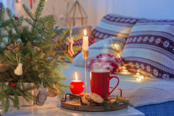 istock christmas home decorations with candles in red and white colors 1355080348