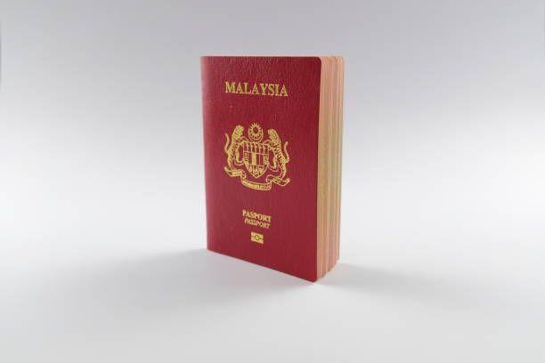 istock Malaysia passport isolated on white background. 1355081862