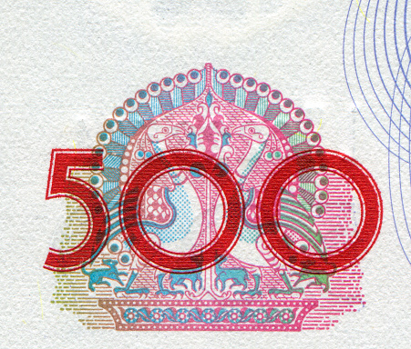 Macro close-up of banknote pattern design