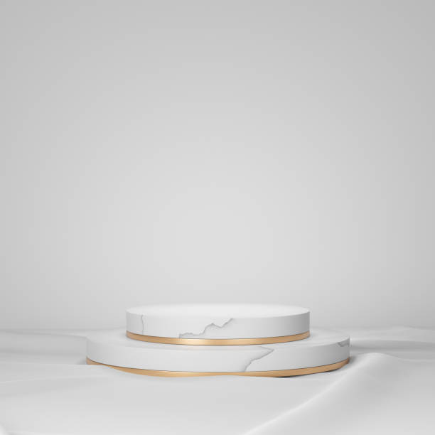 istock 3D rendering background. Two layer white marble gold cylinder stage podium on white cloth floor. 1355083929