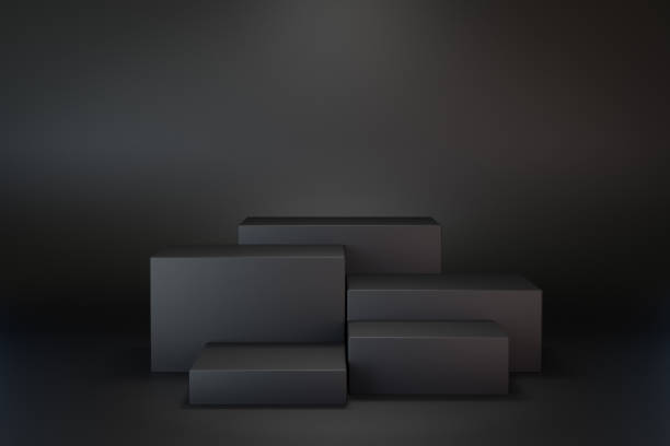 istock 3D rendering dark background. Five step black box stage podium on black background. 1355083960