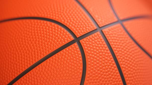 istock Orange basketball ball close-up background 1355084157