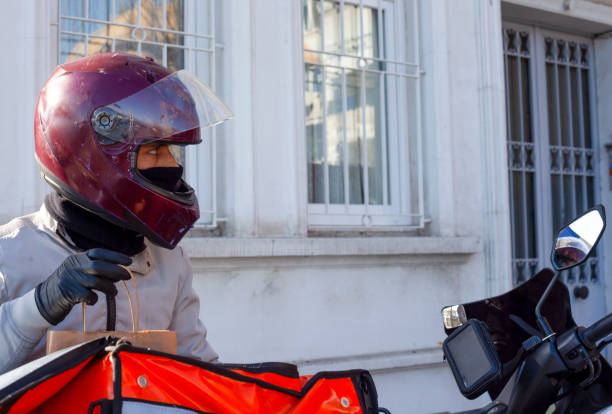 istock Moto Bike courier 1355086312