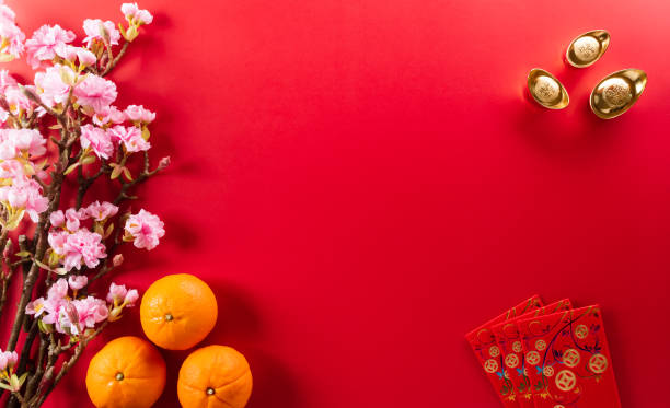 istock Chinese new year decorations made from red packet, orange and go 1355087506