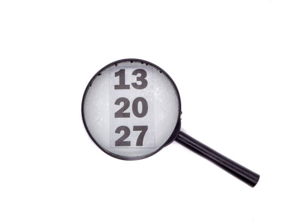 istock Magnifying glass isolated on white background 1355088730