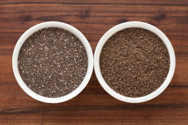 istock Whole and ground chia seeds 1355090331