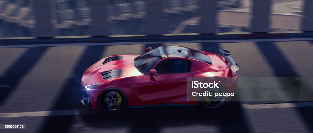 Generic Red Electric Sports Car Moving At High Speed Along A Tunnel Above Urban Surroundings A wide angle image of a red sports car moving at high speed along a stretch of road inside a tunnel formed by pillars. With motion blur to the wheel, road and background. The car could be electric, hybrid or petrol driven. Hybrid Car Stock Photo