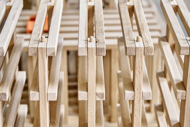 istock Wine rack of solid oak in the workshop closeup 1355092602