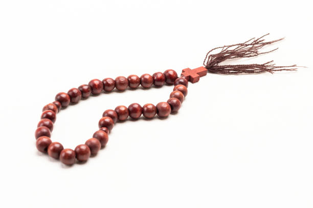 istock Brown rosary with a cross. 1355092747