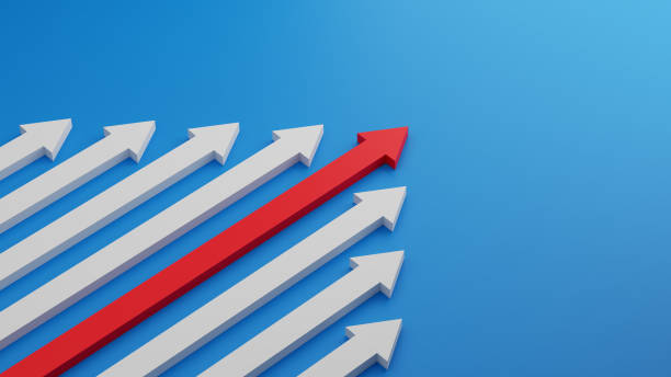 istock Leader Red arrow leading white arrow on blue background. Teamwork, Cooperation, Business Partner, Leadership concept 1355093924