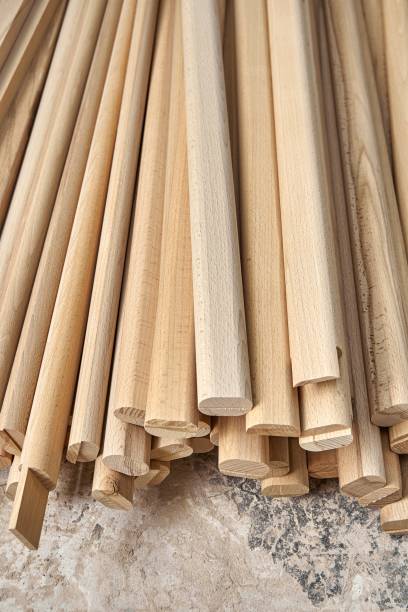 istock Wooden bars of solid beechwood in carpentry workshop 1355094203