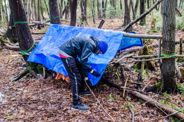 How to build a shelter with a tarp and rope