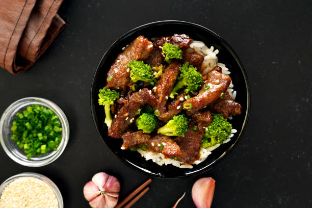 istock Beef and broccoli stir fry with rice 1355101771