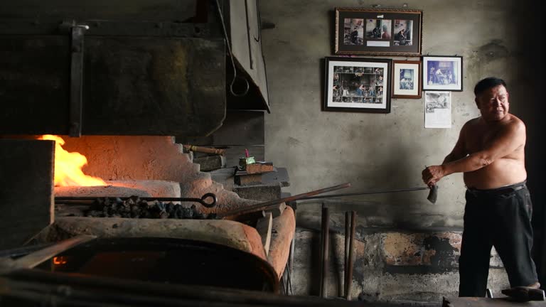 Senior Blacksmith At Work