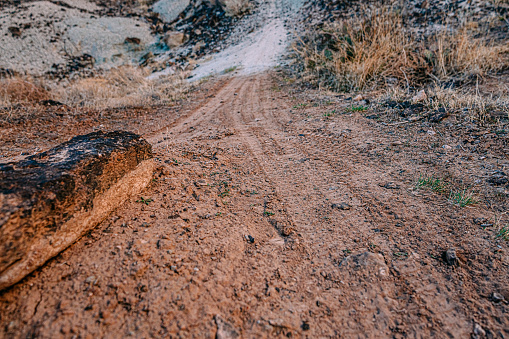 Low Wide Angle Shot of Fresh Mountain Bike Tracks in Red Colorado Dirt