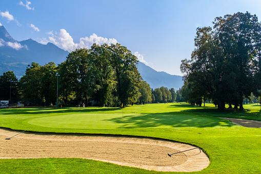 Golf players at the Golf Club Bad Ragaz, in the Swiss canton of St. Gallen.