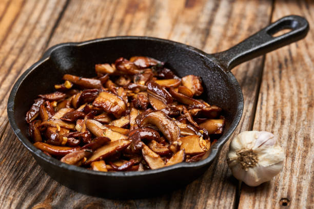istock Sauteed mushrooms with garlic and herbs 1355108516