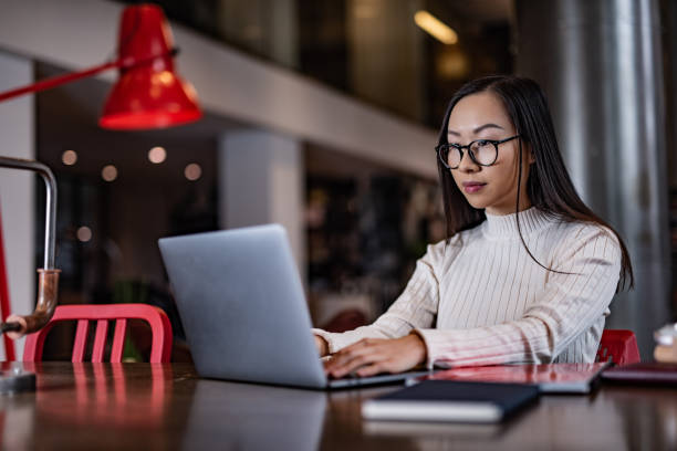 istock Woman working on laptop in office 1355108686