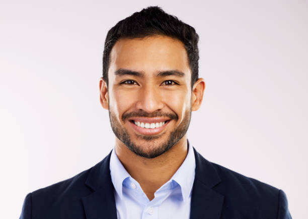 istock Studio shot of a handsome and happy young man posing against a grey background 1355110830