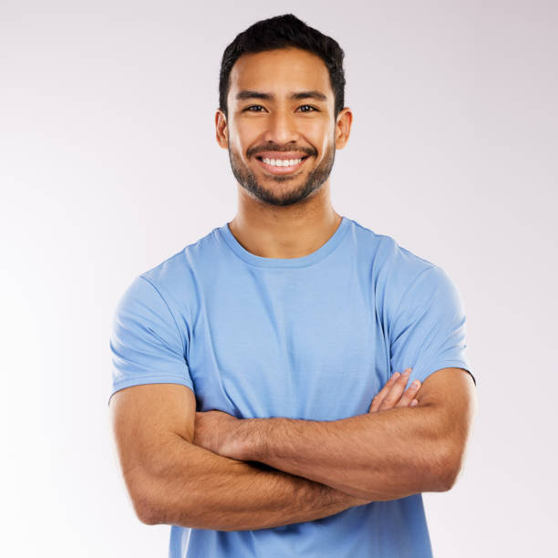 istock Shot of a man standing against a grey background 1355110850