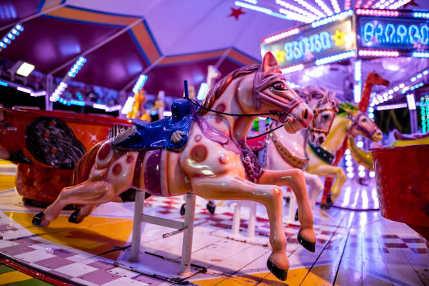 istock Horse carousel for kids at the evening 1355111091