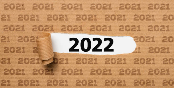 istock Torn  paper revealing the number 2022 1355116262