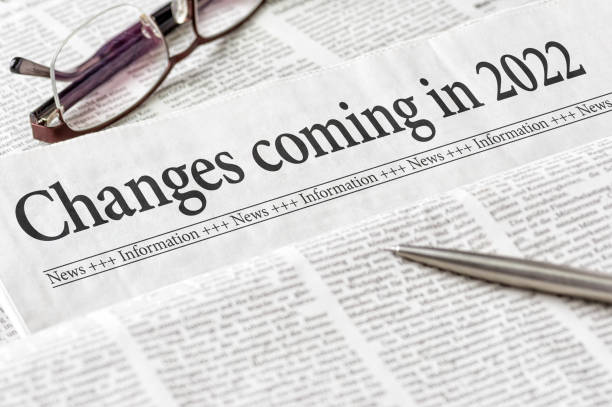 A newspaper with the headline Changes coming in 2022 A newspaper with the headline Changes coming in 2022 front page stock pictures, royalty-free photos & images