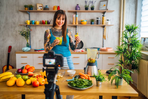 istock Woman vlogging healthy smoothies recipes 1355117189