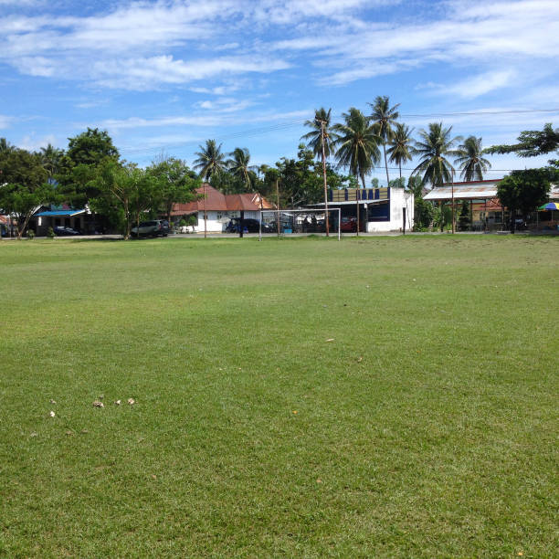 istock Soccer field with cloudy in the countryside. 1355119017