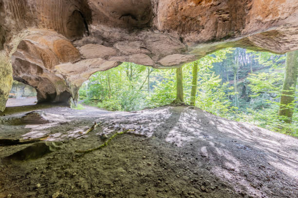 istock Old quarry in the Huel Lee or Hohllay rock formation, hollow stone, circular patterns 1355119231