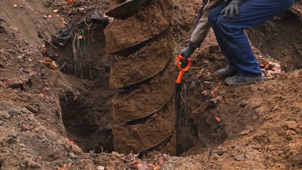 istock Heavy Duty Industrial Earthworks Machine Drill Rotating Excavating Ground 1355131653