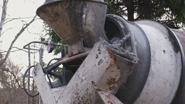 istock Cement Concrete Mixer Truck Close Up 1355131686