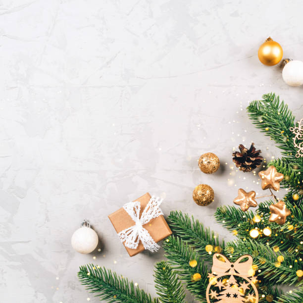 istock Christmas composition of fir tree branches and decorations. 1355137440