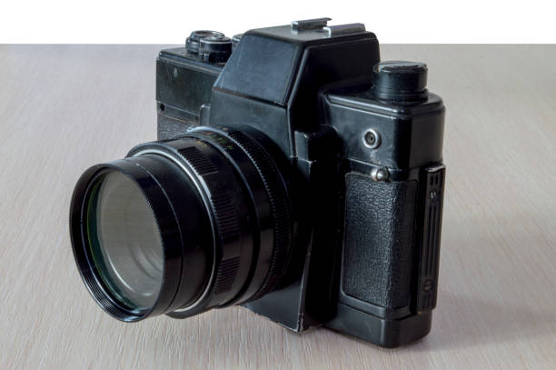 old SLR film camera on a white background