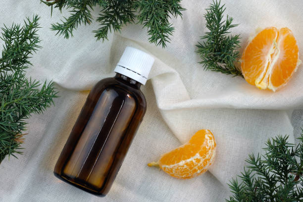 istock Tangerine kernel cosmetic oil top view. 1355144962